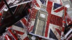 Union flags and the Big Ben clocktower cover notebooks are seen on sale in London, Britain, Thursday  December 17, 2015.  REUTERS/Luke MacGregor