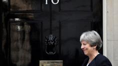 Britain's Prime Minister Theresa May walks out of 10 Downing Street to greet the Prime Minister of Estonia, Juri Ratas in London, January 30, 2018. REUTERS/Toby Melville