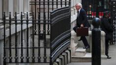 Britain's Secretary of State for Exiting the European Union David Davis arrives in Downing Street, London, December 5, 2017. REUTERS/Hannah McKay