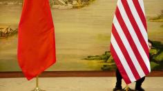 U.S. flag is tweaked ahead of a news conference between U.S. Secretary of State John Kerry and Chinese Foreign Minister Wang Yi at the Ministry of Foreign Affairs in Beijing