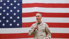 Gen. Joseph Dunford, chairman of the Joint Chiefs of Staff, speaks during celebrations on Christmas Eve at a U.S. airfield in Bagram