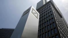 FILE PHOTO: Logos of Deutsche Bank AG are seen in Tokyo July 16, 2014. REUTERS/Toru Hanai/File Photo      