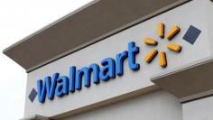 The logo of Down Jones Industrial Average stock market index listed company Walmart is shown on one of its stores in Encinitas, California April 13, 2016.  REUTERS/Mike Blake