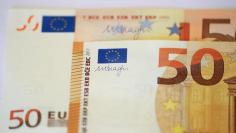 FILE PHOTO: The signature of the President of the European Central Bank (ECB), Mario Draghi, is seen on the new 50 euro banknote during a presentation by the German Central Bank (Bundesbank) at its headquarters in Frankfurt, Germany, March 16, 2017.     