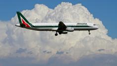 FILE PHOTO: An airplane of Alitalia approaches to land at Fiumicino international airport in Rome