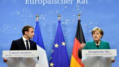 French President Macron and German Chancellor Merkel give a joint news conference in Brussels