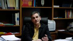Greek Finance Minister Euclid Tsakalotos speaks during an interview with Reuters at his office in the Finance ministry in Athens, Greece, January 30, 2018. REUTERS/Costas Baltas