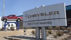 FILE PHOTO: A Chrysler Warren Truck Assembly sign is seen in front of the Fiat Chrysler Automobiles (FCA) plant in Warren, Michigan October 7, 2015.  REUTERS/Rebecca Cook/File Photo - RC191D574F80