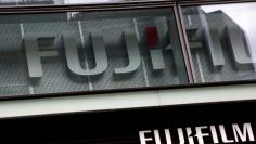 Fujifilm's company logos are seen at its exhibition hall nearby the headquarters of Fujifilm Holdings Corp in Tokyo, Japan June 12, 2017. REUTERS/Kim Kyung-Hoon