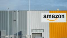 FILE PHOTO: A view of the new Amazon logistic center with the company's logo in Dortmund, Germany November 14, 2017. REUTERS/Thilo Schmuelgen 
