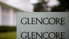 FILE PHOTO: The logo of Glencore is seen in front of the company's headquarters in Baar
