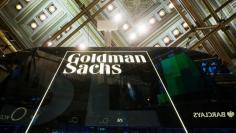 A Goldman Sachs sign is seen above the floor of the New York Stock Exchange shortly after the opening bell in the Manhattan borough of New York January 24, 2014.  REUTERS/Lucas Jackson/File Photo  