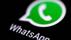 FILE PHOTO: The WhatsApp messaging application is seen on a phone screen August 3, 2017.   REUTERS/Thomas White/File Photo