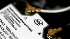 FILE PHOTO: An Intel WLAN wifi component inside a laptop is seen in this illustration photo June 21, 2017.   REUTERS/Thomas White/Illustration/File Photo   