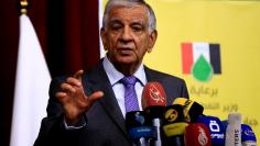 FILE PHOTO: Iraqi Oil Minister Jabar al-Luaibi speaks during news conference at the ministry of oil in Baghdad