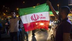 Iranians celebrate on the streets following a nuclear deal with major powers, in Tehran July 14, 2015.  REUTERS/TIMA
