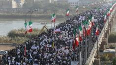 People take part in pro-government rallies, Iran, January 3, 2018. Tasnim News Agency/Handout via REUTERS 