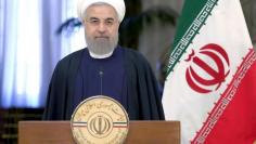 Iranian President Hassan Rouhani attend a news conference with Swiss President Johann Schneider-Ammann in Tehran February 27, 2016.REUTERS/Raheb Homavandi/TIMA  