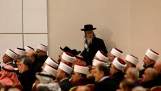 A member of Neturei Karta, a fringe ultra-Orthodox movement within the anti-Zionist bloc, attends the meeting of the Palestinian Central Council in the West Bank city of Ramallah