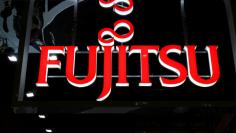 A logo of Fujitsu Ltd. is pictured at the CEATEC JAPAN 2017 (Combined Exhibition of Advanced Technologies) at the Makuhari Messe in Chiba, Japan, October 2, 2017.   REUTERS/Toru Hanai