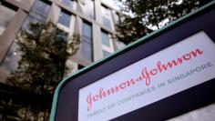 Johnson and Johnson logo is seen at an office building in Singapore