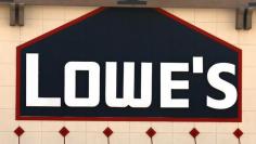 FILE PHOTO: A view of the sign outside the Lowes store in Westminster, Colorado February 26, 2014. REUTERS/Rick Wilking 