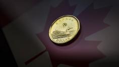 A Canadian dollar coin, commonly known as the "Loonie", is pictured in this illustration picture taken in Toronto January 23, 2015.   REUTERS/Mark Blinch 