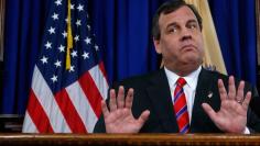 New Jersey Governor Christie reacts to a question during a news conference in Trenton