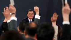 South Korean President Moon Jae-in attends his New Year news conference at the Presidential Blue House in Seoul, South Korea, January 10, 2018.  REUTERS/Kim Hong-Ji