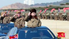 North Korean leader Kim Jong Un salutes as he arrives to inspect a military drill at an unknown location, in this undated photo released by North Korea's Korean Central News Agency (KCNA) on March 25, 2016. REUTERS/KCNA
