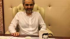 FILE PHOTO - Saudi Arabian billionaire Prince Alwaleed bin Talal sits for an interview with Reuters in the office of the suite where he has been detained at the Ritz-Carlton in Riyadh, Saudi Arabia
