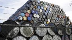 FILE PHOTO: Used oil barrels are stacked at a storage facility in Seattle, Washington February 12, 2015.   REUTERS/Jason Redmond  