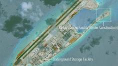 FILE PHOTO: Construction is shown on Fiery Cross Reef, in the Spratly Islands, the disputed South China Sea in this June 16, 2017 satellite image released by CSIS Asia Maritime Transparency Initiative at the Center for Strategic and International Studies