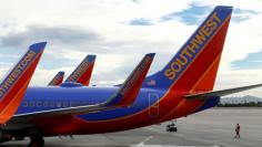 FILE PHOTO: Southwest commercial airliners taxied at McCarran International Airport in Las Vegas, November 19, 2014.  REUTERS/Mike Blake/File Photo 