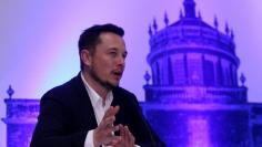 SpaceX CEO Elon Musk attends a news conference after unveiling his plans to colonize Mars at the International Astronautical Congress in Guadalajara