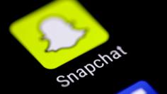 FILE PHOTO: The Snapchat messaging application is seen on a phone screen August 3, 2017.   REUTERS/Thomas White/File Photo