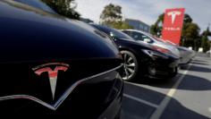FILE PHOTO --  A Tesla Model X is photographed alongside a Model S at a Tesla electric car dealership in Sydney