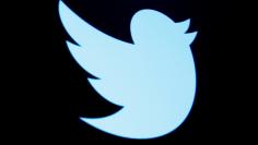 FILE PHOTO - The Twitter logo is displayed on a screen on the floor of the New York Stock Exchange (NYSE) in New York City, U.S., September 28, 2016. REUTERS/Brendan McDermid/File Photo