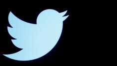 The Twitter logo is displayed on a screen on the floor of the New York Stock Exchange (NYSE) in New York City, U.S., September 28, 2016. REUTERS/Brendan McDermid/File Photo - S1AEUJLJHTAA