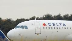 FILE PHOTO -  A Delta Airlines jet lines up at BWI Thurgood Marshall International Airport near Baltimore, Maryland