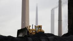 usFILE PHOTO: A bulldozer moves coal at the Murray Energy Corporation port facility in Powhatan Point, Ohio