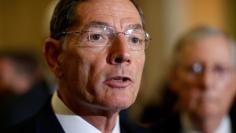 FILE PHOTO: Senator John Barrasso (R-WY) speaks during a press conference on Capitol Hill in Washington, U.S., September 12, 2017.   REUTERS/Joshua Roberts