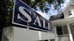 FILE PHOTO: A 'sale' sign advertises a home in Alexandria, Virginia July 22, 2010. REUTERS/Molly Riley 