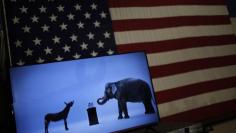 The mascots of the Democratic and Republican parties, a donkey for the Democrats and an elephant for the GOP, are seen on a video screen at Democratic U.S. presidential candidate Hillary Clinton's campaign rally in Cleveland, Ohio in this March 8, 2016 fi