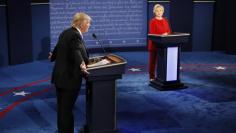 Republican U.S. presidential nominee Trump speaks as Clinton listens during presidential debate at Hofstra University in Hempstead