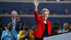 Senator Elizabeth Warren (D-MA) waves during the Democratic National Convention in Philadelphia, Pennsylvania, U.S. July 25, 2016. REUTERS/Lucy Nicholson