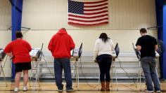 FILE PHOTO: Voters cast their votes during the U.S. presidential election in Elyria, Ohio, U.S. November 8, 2016.  REUTERS/Aaron Josefczyk/File Photo 