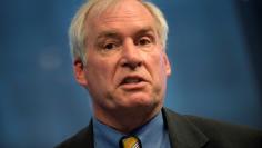 File Photo: The Federal Reserve Bank of Boston's President and CEO Eric S. Rosengren speaks in New York, April 17, 2013. REUTERS/Keith Bedford/File Photo 