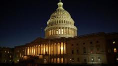 FILE PHOTO: The U.S. Capitol Building is lit at sunset in Washington, U.S., December 20, 2016.  REUTERS/Joshua Roberts/File Photo