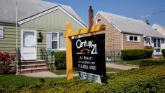 FILE PHOTO: A 'House For Sale' sign is seen outside a single family house in Uniondale, New York, U.S., May 23, 2016.  REUTERS/Shannon Stapleton/File Photo